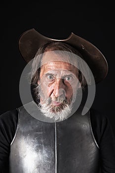 Quijote. Old bearded warrior with breastplate and helmet