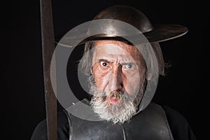 Quijote. Old bearded warrior with breastplate and helmet