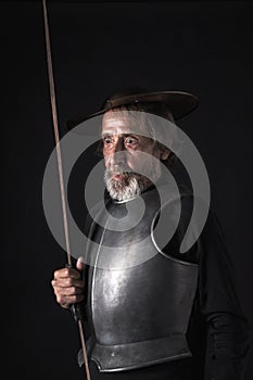 Quijote. Old bearded warrior with breastplate and helmet