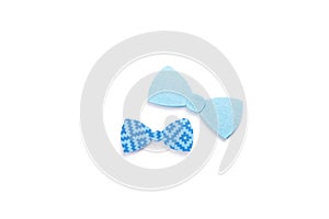 Quilling. Ribbon bow ties on a light background. Family concept.