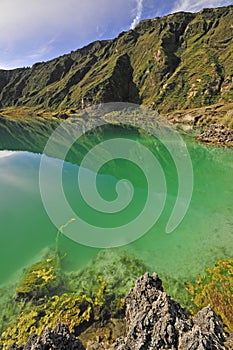 Quilotoa crater lake in the andes mountains of Ecuador