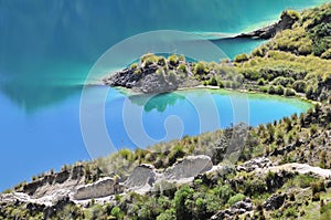 Quilotoa crater lake in the andes mountains of Ecuador