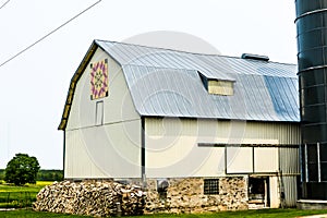 Quilt Barn with Wood Pile