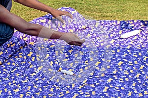 The quilt making is in progress in the soft winter sun