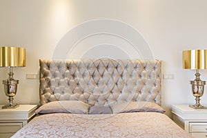 Quilted headboard bed photo
