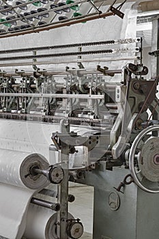 Quilting machine, mattress production in the factory.