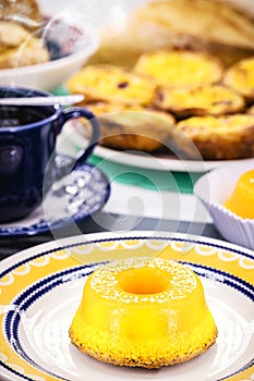 Quindim or Brisa do Lis, typical sweet from Brazil and Portugal, made with egg yolks, almonds or grated coconut photo