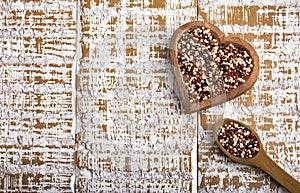 Quinoa mix in the heart shaped bowl - Chenopodium quinoa