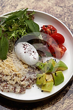 Quinoa porridge breakfast with oatmeal  poached egg