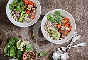 Quinoa and pumpkin bowl. Vegetarian, healthy, diet food concept. On a wooden table, top view.