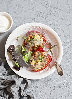 Quinoa stuffed baked bell peppers. Healthy vegetarian diet food concept.