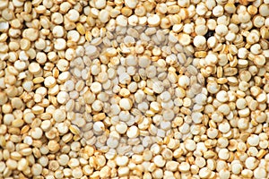 Quinoa White grains background, flat lay backdrop. Gluten free Healthy food. Diet, dieting concept. Seeds of white quinoa