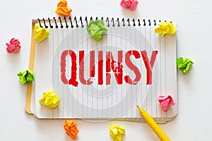 quinsy word on wooden cubes. quinsy concept. medical concept photo