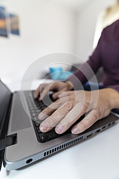 Quit concept. Pressing the escape button on a laptop