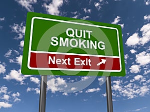 Quit smoking next exit road sign