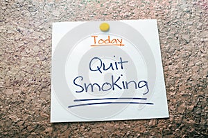 Quit Smoking Reminder For Today On Paper Pinned On Cork Board