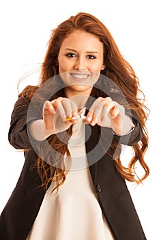 Quit smoking - woman breaking cigarette isolated over white back