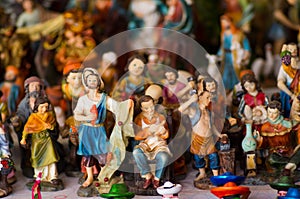 QUITO, ECUADOR- 07 MAY, 2017: Beautiful small figures made of clay over a white table