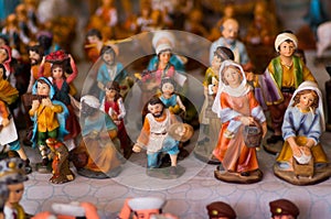 QUITO, ECUADOR- 07 MAY, 2017: Beautiful small figures made of clay over a white table