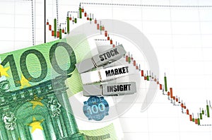 On the quote chart there are euros and clothespins with the inscription - Stock Market Insight