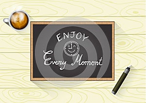 Quote Typographical on Chalkboard Background, design, Hand drawn lettering. Enjoy Every Moment with chalkboard lettering