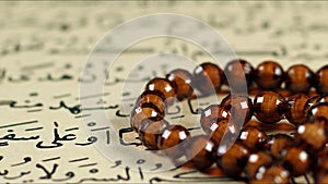 Quran the holy book of muslim religion and Pray Counting Bead