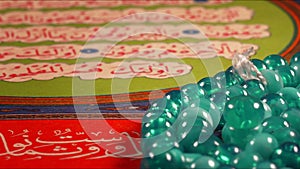 Quran the holy book of muslim religion and Pray Counting Bead