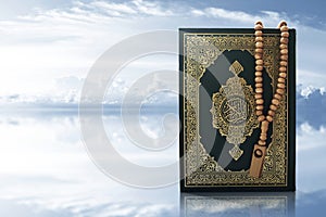 Quran holy book on sky background