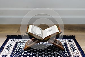 The Quran on the prayer rag