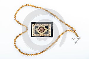 Quran with Rosary - holy book of Muslims - Koran - quran white background photo