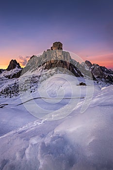 Ra Gusela peak in front of mount Averau and Nuvolau, in Passo Giau, high alpine pass near Cortina d`Ampezzo, Dolomites, Italy