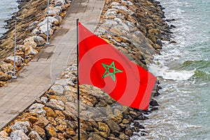 Rabat. Flag of Morocco on the beautiful beach of Rabat.