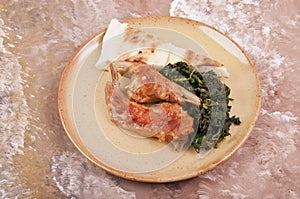 Rabbit cacciatore with spinach