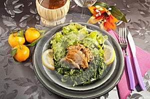 Rabbit cacciatore with spinach