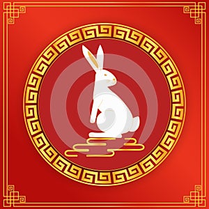 Rabbit in Chinese golden circle frame on a red background. the New Year 2023