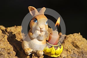 Rabbit figure on a black background