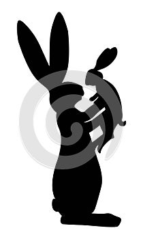 The rabbit holds a baby rabbit in its paws. Rabbit figures in black