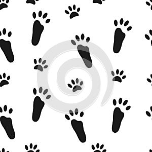 Rabbit paws. Seamless pattern with black footprints of hare on white background.