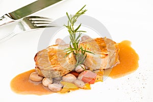 Rabbit stuffed with wild mushrooms, served with sauted haricot b