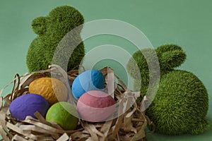 Couple of rabbits and easter eggs photo
