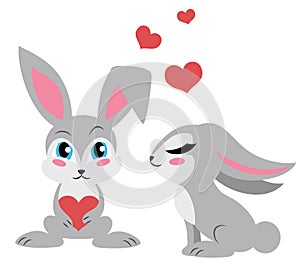 Two cute rabbits. One holding a heart.