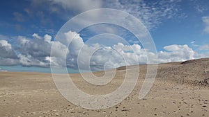 Rabjerg Mile is a migrating coastal dune between Skagen and Frederikshavn, Denmark