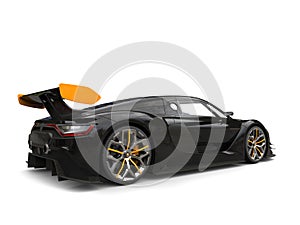 Race car - black with yellow rear wing and yellow details on the wheels
