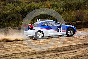 Race car on a dusty road