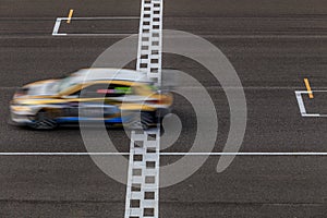 Race car racing on speed track