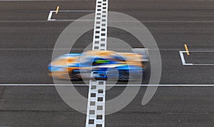 Race car racing on speed track