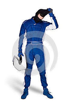 Race driver in blue white motorsport overall shoes gloves and safety crash helmet take off blaclava after finish  isolated white