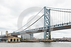 Race Street Pier and Cherry Street Pier on the Delaware River waterfront underneath the Benjamin Franklin Bridge in Philadelphia,