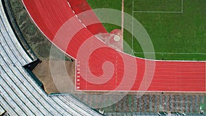 Race track or athletics track start line with lane numbers in stadium Top view Drone shot high angle view