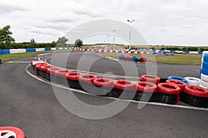 Race track go kart barrier made with old tires for safety concept